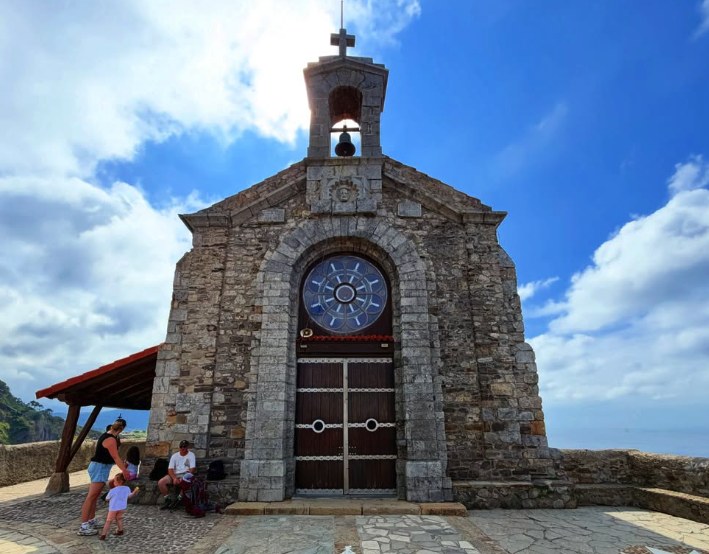 The stone hermitage at the summit of Gaztelugatxe with its bell-gable and rose window